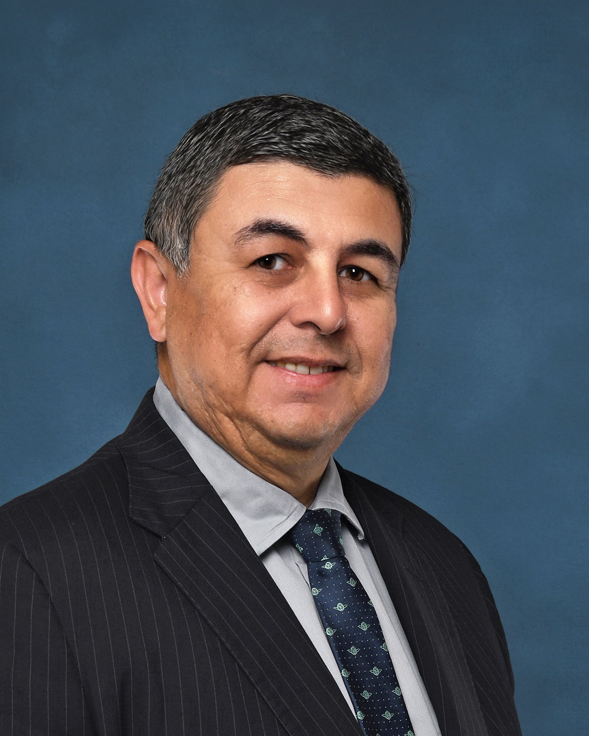 Hector E. Gonzales, PhD, CPA Trustee